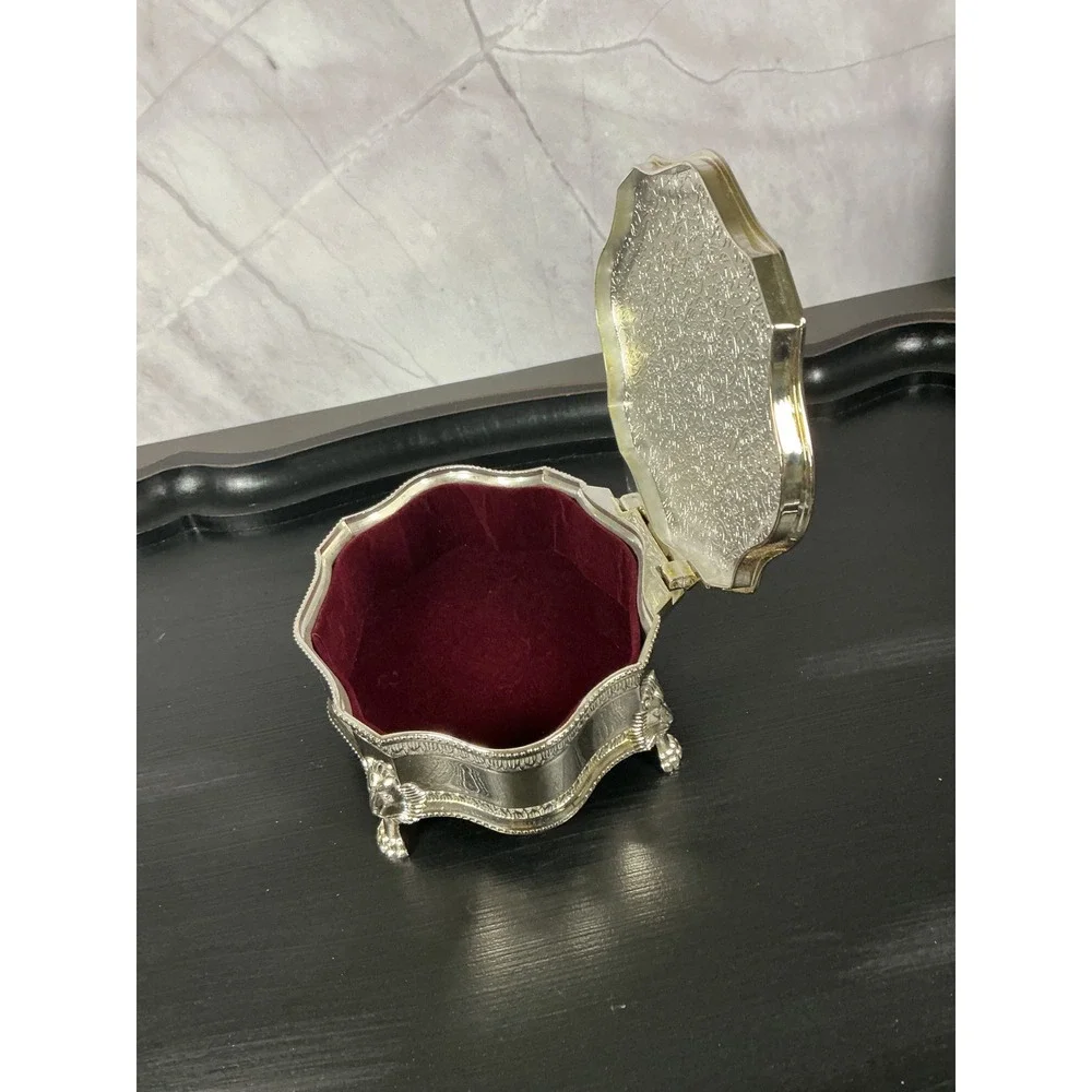 International Silver Company scrollwork solution crest